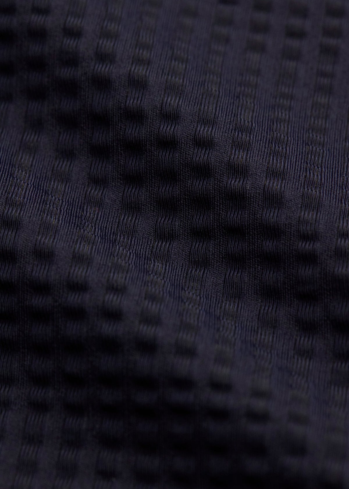 Close-up of dark blue textured fabric