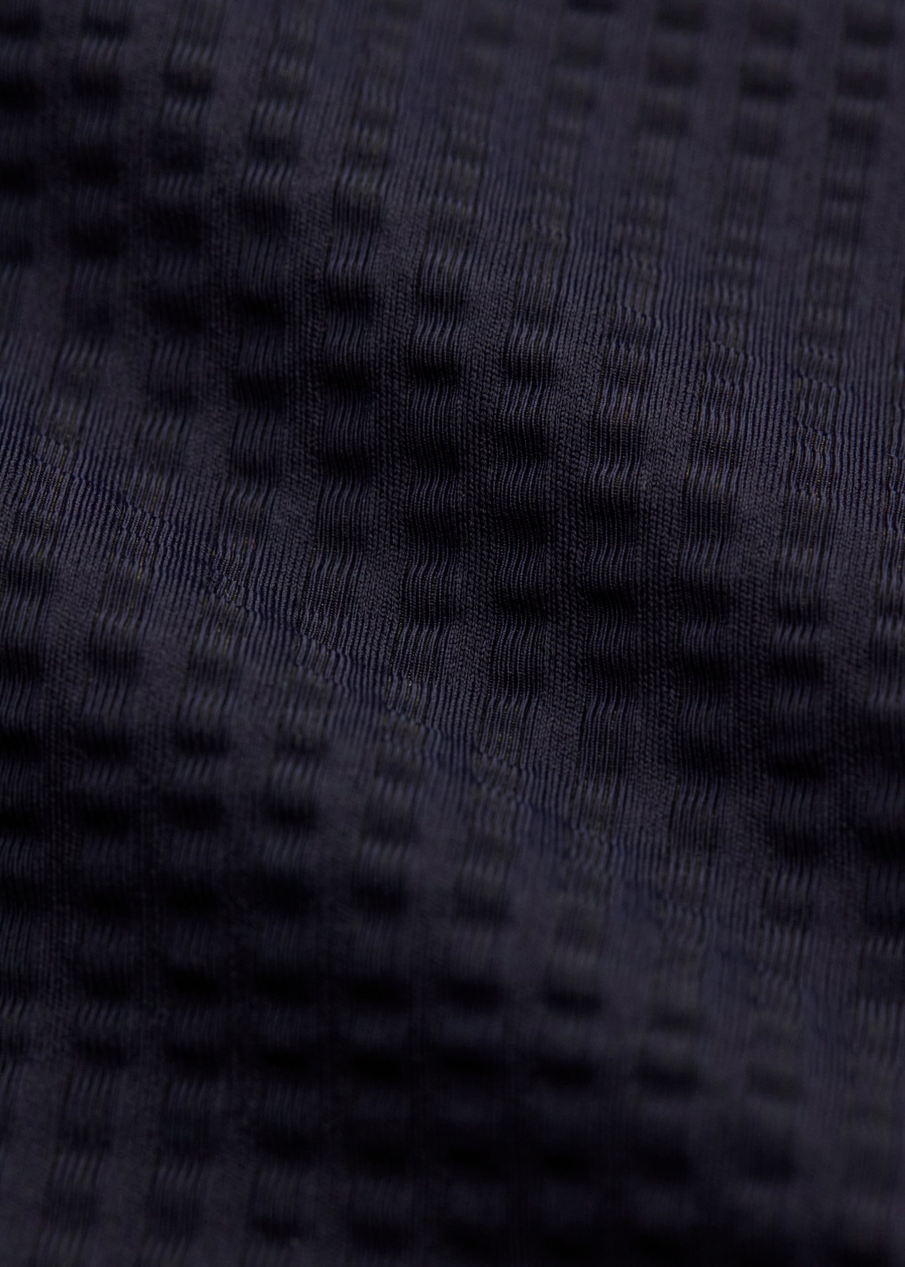 Close-up of dark blue textured fabric