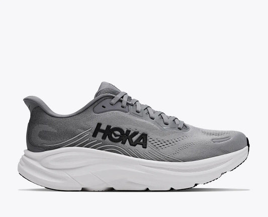 Black and white running shoe with 'Brooks' branding on a white background
