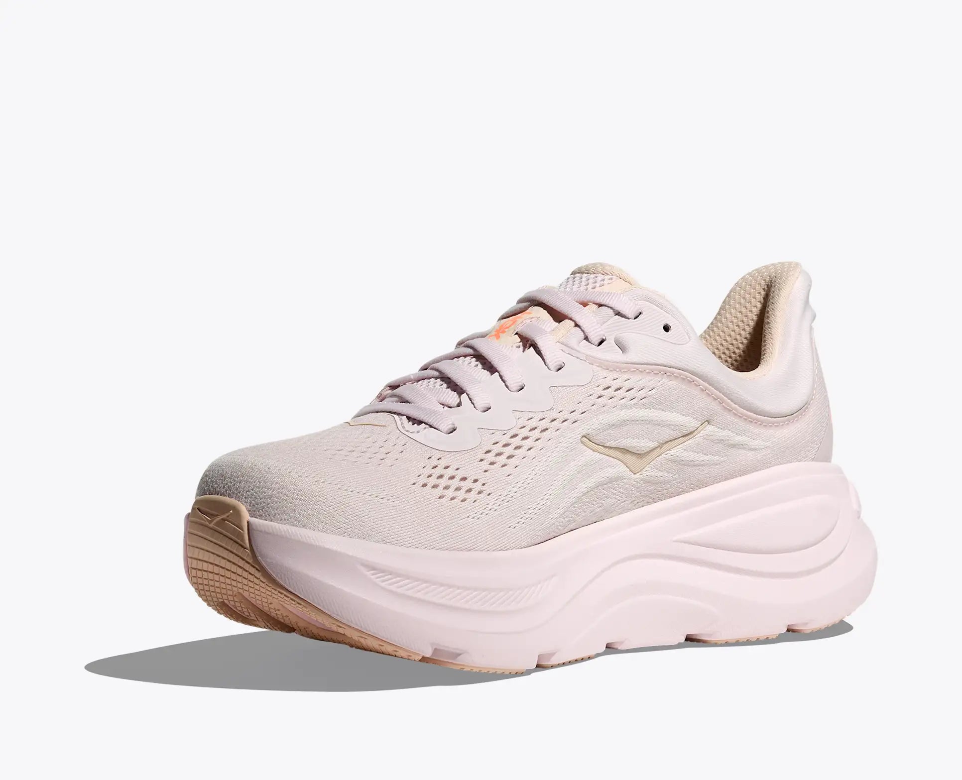 Light pink running shoe with a light pink sole on a white background