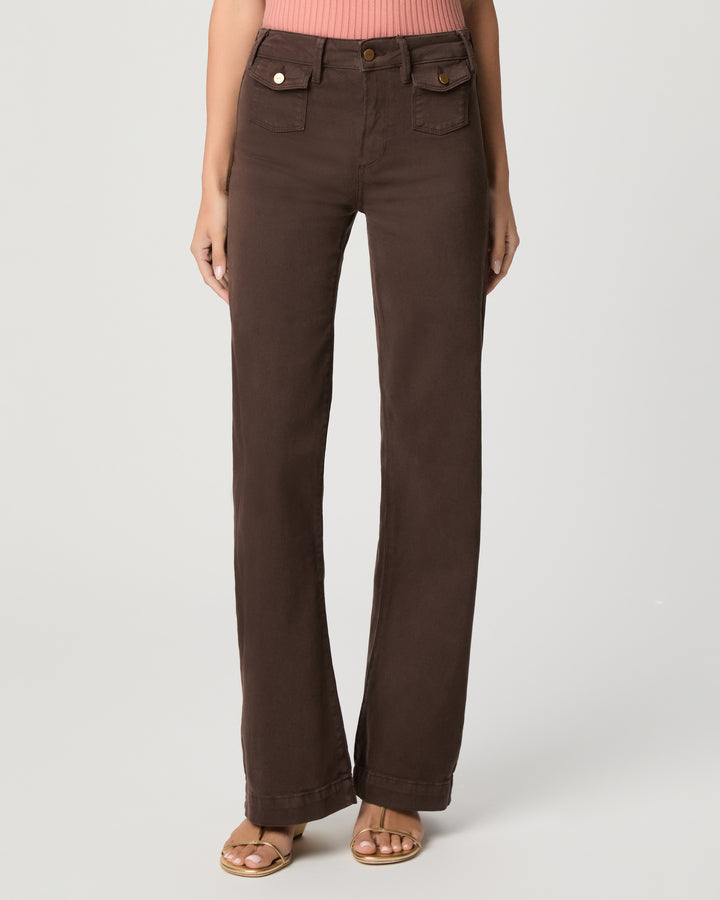 Brown pants worn by a person on a white background