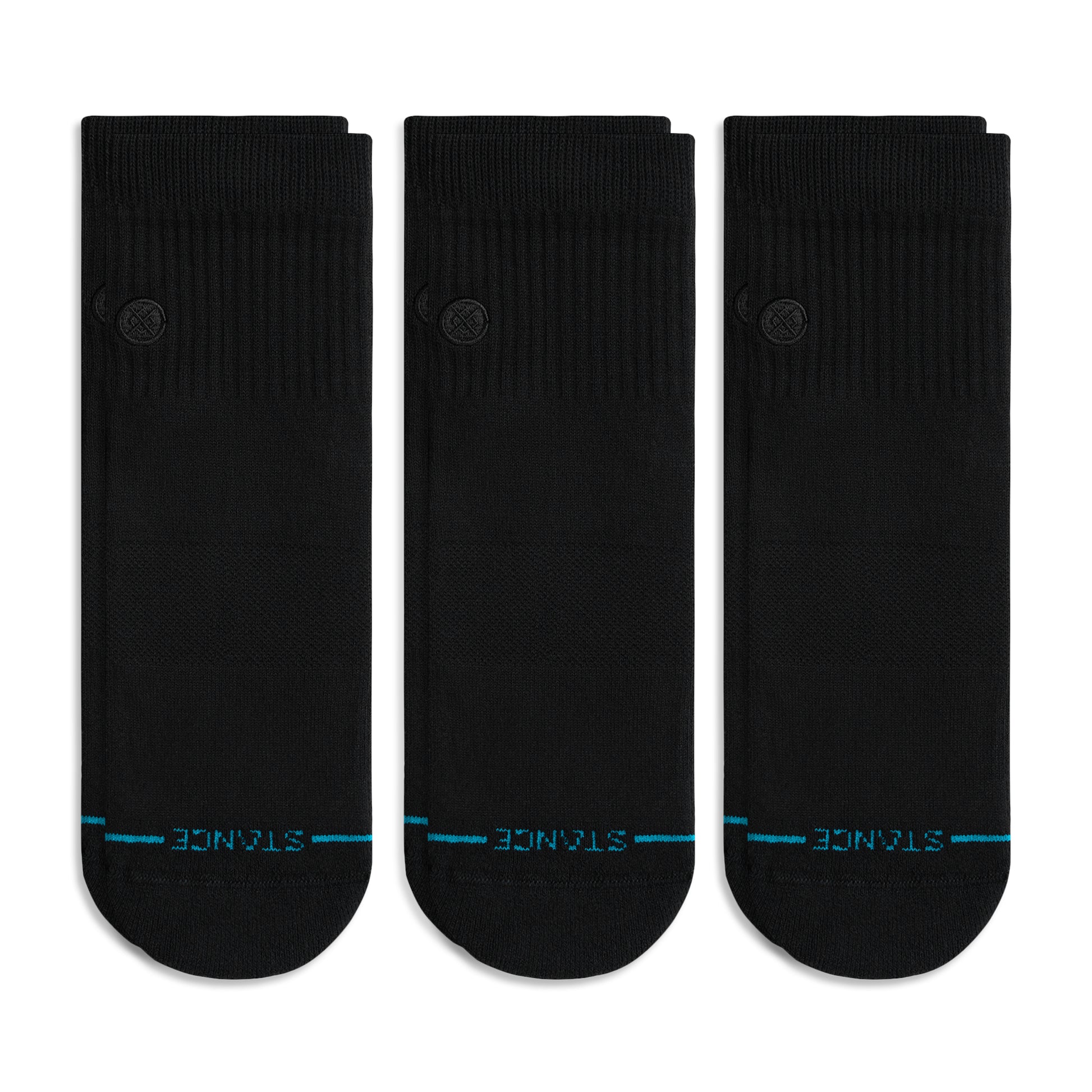 Three black socks with blue stitching on a white background